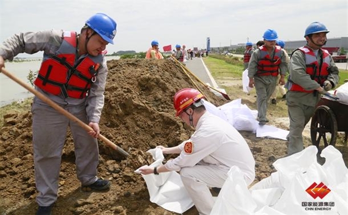 國家能源集團國華九江電廠地企聯動共築萬米子堤