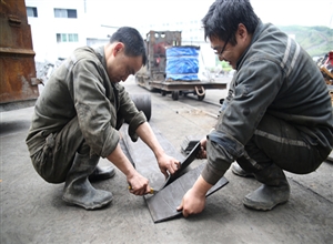 川煤集團廣能公司龍灘運輸隊:廢舊皮帶變寶創效